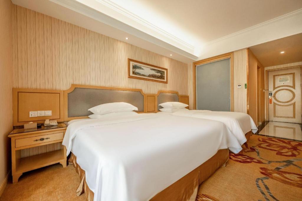 เวียนนา 3 เบสต์ เสี่ยวซาน เฉียนเจียง เซ็นจูรีซิตี้ Hotel หางโจว ภายนอก รูปภาพ