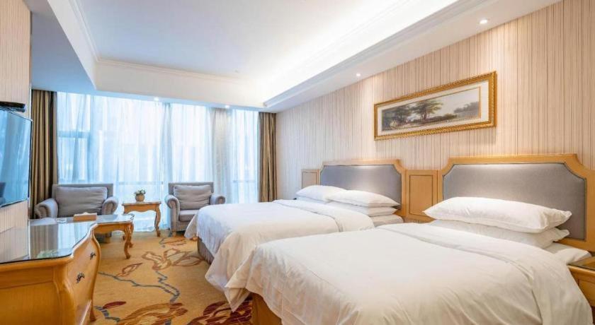 เวียนนา 3 เบสต์ เสี่ยวซาน เฉียนเจียง เซ็นจูรีซิตี้ Hotel หางโจว ภายนอก รูปภาพ