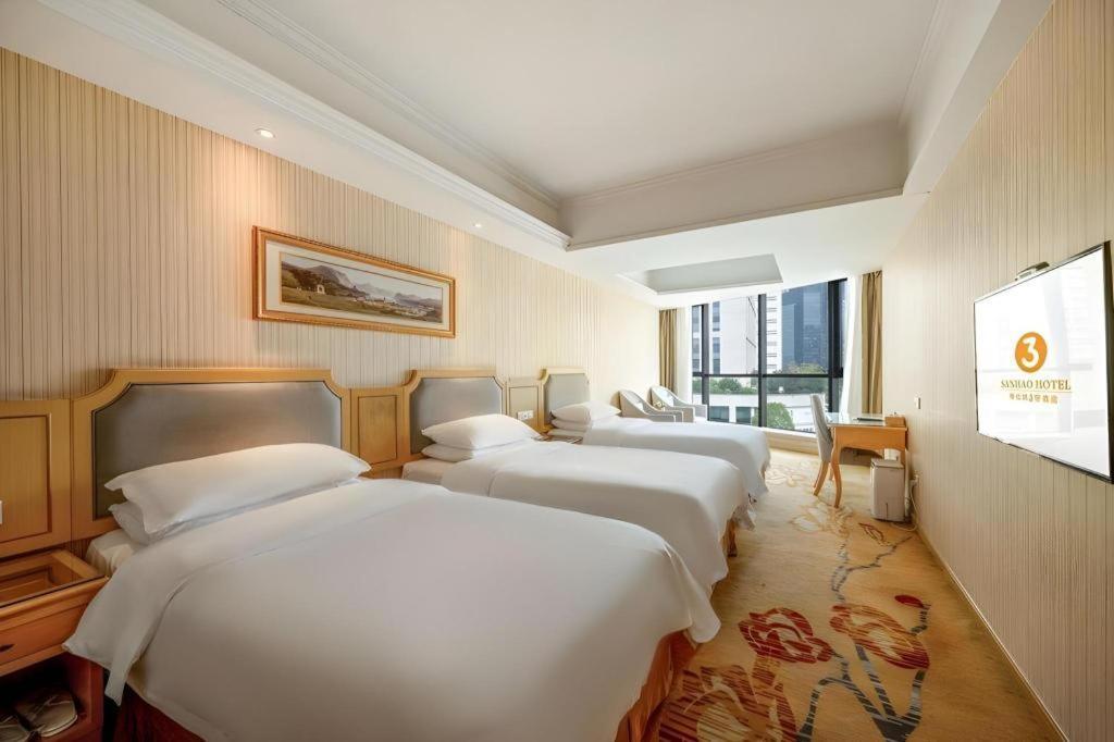 เวียนนา 3 เบสต์ เสี่ยวซาน เฉียนเจียง เซ็นจูรีซิตี้ Hotel หางโจว ภายนอก รูปภาพ
