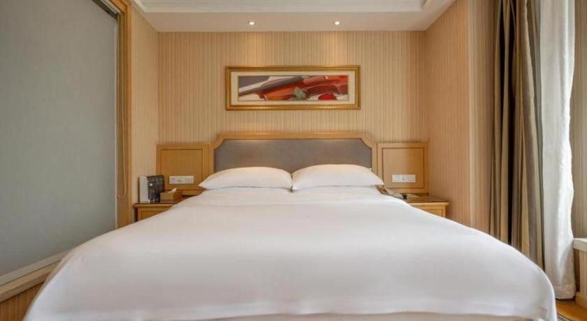 เวียนนา 3 เบสต์ เสี่ยวซาน เฉียนเจียง เซ็นจูรีซิตี้ Hotel หางโจว ภายนอก รูปภาพ