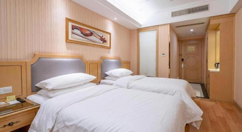 เวียนนา 3 เบสต์ เสี่ยวซาน เฉียนเจียง เซ็นจูรีซิตี้ Hotel หางโจว ภายนอก รูปภาพ
